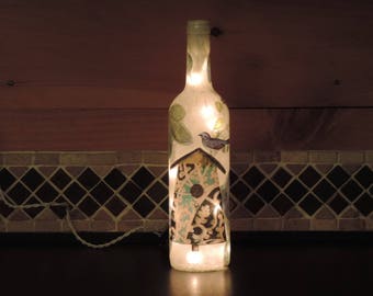 Bird house with blue bird wine bottle light tissue paper collage