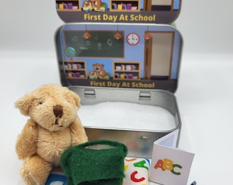 Tiny teddy first day at school pocket tin. Various colour options.