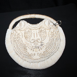 Cartera, neceser, cartera de mano y billetera con cara de gato de Checoslovaquia