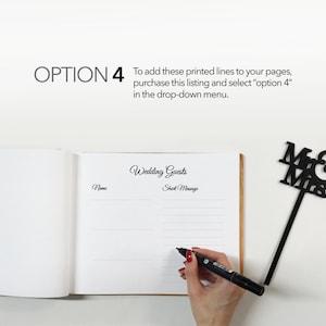 May include: A white wedding guest book with a black pen and a black "Mr & Mrs" topper. The book has lines for guests to write their names and short messages.