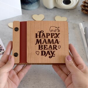 Make her day with a wooden 'Happy Mama-Bear Day' photo album – the sweetest Mother's Day gift!
