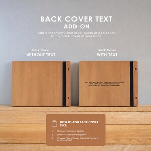 two wooden back cover books with text on them, placed on a wooden surface.