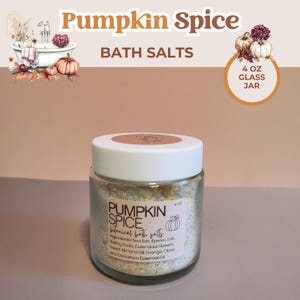 May include: A clear glass jar of Pumpkin Spice botanical bath salts with a white lid. The label includes the text "Pumpkin Spice" and "Bath Salts". The jar is labeled as a 4 oz glass jar.