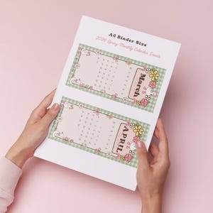 May include: A6 binder size calendar inserts for 2026. The inserts feature a light pink background with a green gingham border. The months of March and April are displayed with floral and swan illustrations. Text at the top reads "2026 Spring Monthly Calendar Inserts."