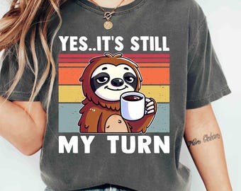 Comfort Colors Shirt Yes, It’s Still My Turn Shirt Coffee Lover Shirt Lazy Day Vintage Cute Retro Sloth Graphic Shirt Funny Board Game shirt