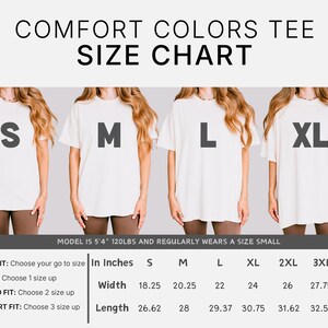 The image is a size chart for a comfortable colors tee, showing the different sizes available for a model. The chart provides measurements for each size, including height, waist, and leg length, as well as the corresponding width and dress shirt fit.