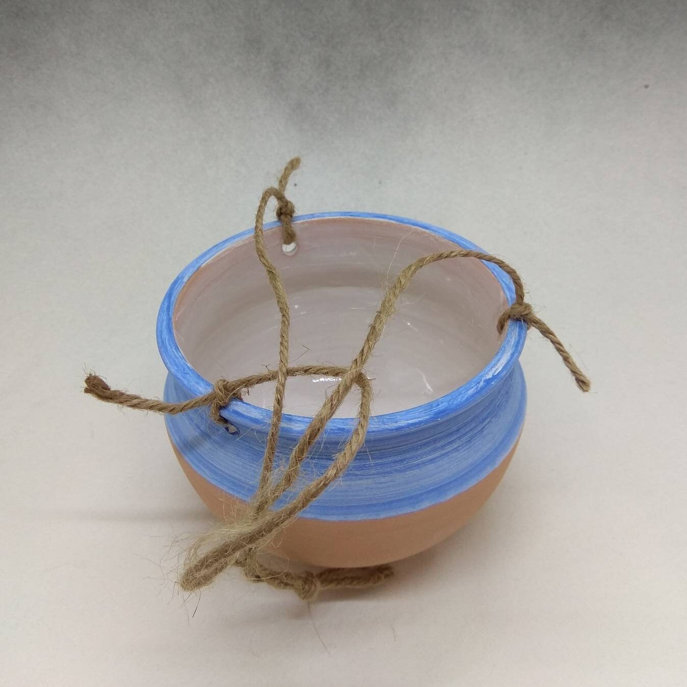 It is a small vase to hang 7.5 Diam Tall cm To be used as aflower holder or as a bird feeder. 10 made at the lathe It is a small vase to hang 7.5 Diam Tall cm To be used as aflower holder or as a bird feeder. 10 made at the lathe