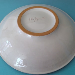 Artistic ceramic bowl shaped on the lathe and decorated by hand. image 6