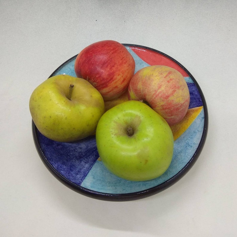 Artistic ceramic bowl shaped on the lathe and decorated by hand. image 7