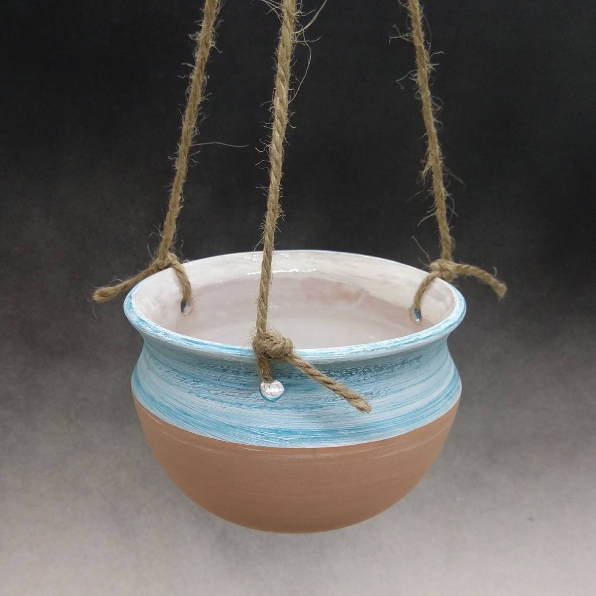 It is a small vase to hang 7.5 Diam Tall cm To be used as aflower holder or as a bird feeder. 10 made at the lathe It is a small vase to hang 7.5 Diam Tall cm To be used as aflower holder or as a bird feeder. 10 made at the lathe