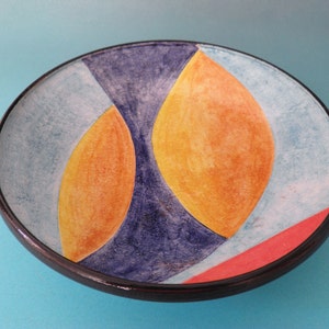 Artistic ceramic bowl shaped on the lathe and decorated by hand. image 3