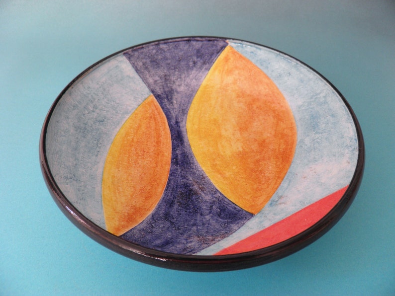 Artistic ceramic bowl shaped on the lathe and decorated by hand. image 3