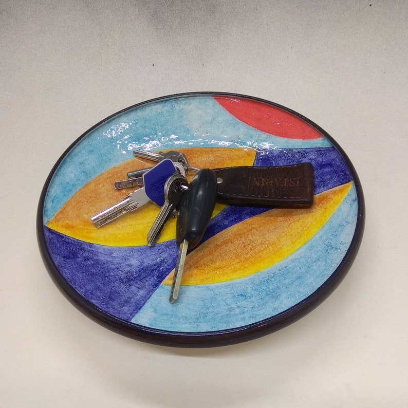 Artistic ceramic bowl shaped on the lathe and decorated by hand. image 8