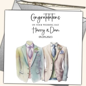 May include: A wedding card with a watercolor illustration of two men in suits. The card says "Congratulations on your wedding day Harry & Dan 05.09.2023".