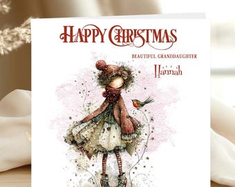 May include: A square greeting card featuring the text HAPPY CHRISTMAS BEAUTIFUL GRANDDAUGHTER Hannah. The illustration depicts a character in a red coat, striped stockings, and boots, standing near a small bird amidst a soft pink watercolor background.