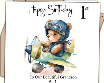 May include: A birthday card featuring a watercolor illustration of a teddy bear wearing aviator goggles and flying a yellow and blue airplane. The card says "Happy Birthday 1st" and "To Our Beautiful Grandson Arlo".