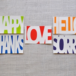 Cartões postais serigrafados... Feliz... Obrigado... Amor... Olá... Desculpe