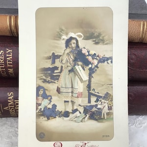 Antique French Christmas Postcard, Beautiful Little Girl with Pretty Dolls, Clogs and Lace Cap, Real Photograph