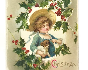アンティーククリスマスポストカード、子犬と少女、エンボス加工されたヒイラギ、1900年代、Wildt & Kray