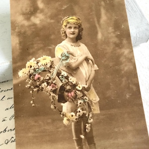 Pretty Girl with Spring Flowers in Basket, White Button Shoes, Hand Tinted Antique Postcard