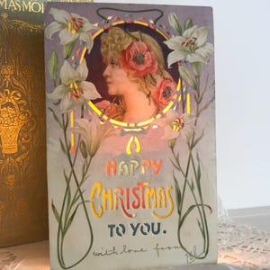 Hold To Light Christmas Postcard, Art Nouveau Woman, Poppies, Lilies, 1908