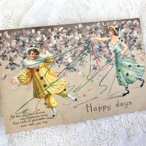 Antike Weihnachtspostkarte, Pierrette und Pierrot, Luftschlangen, Veilchen, Illustration, ‘Gay Karneval’ Art Deco, 1920er Jahre, Selten