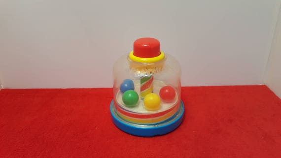 push and spin toy