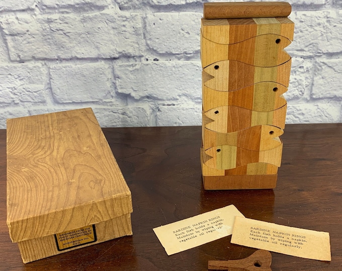 Featured listing image: Mid Century Carved Wooden Sardine Napkin Rings Puzzle with Key by Ambidextrous Inc NYC in Original Box