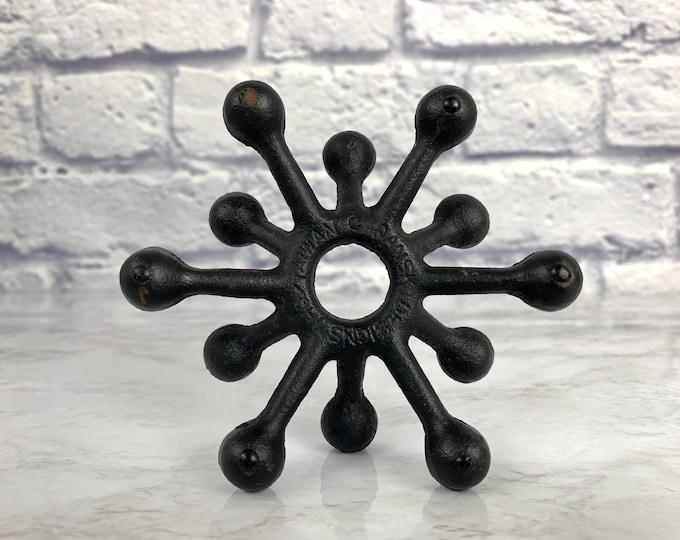 Featured listing image: Dansk Designs Black Cast Iron Tiny Taper Holder Candleholder Designed by Jens Quistgaard Mid Century Modern