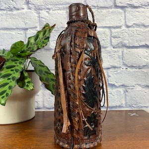 Vintage Tooled Leather Wrapped Decanter Bottle with Lid