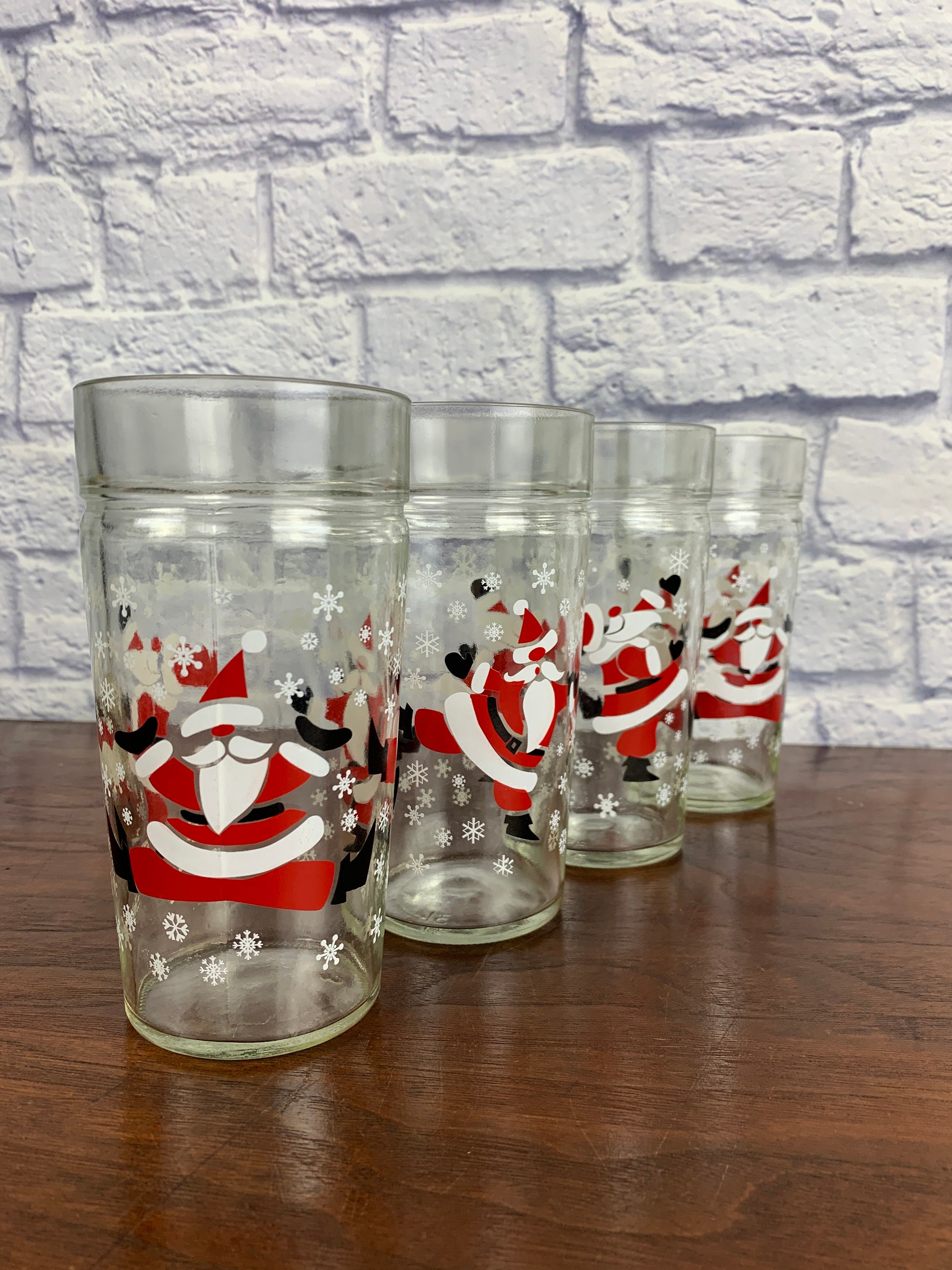 Leaping Santa Claus Anchor Hocking Thick 1970s Christmas Glasses