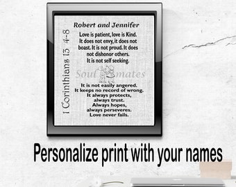 May include: A black and white framed print with a white background and black text. The text reads "1 Corinthians 13 4-8 Robert and Jennifer Love is patient, love is Kind. It does not envy, it does not boast. It is not proud. It does not dishonor others. It is not self seeking. Soulmates It is not easily angered. It keeps no record of wrong. It always protects, always trust. Always hopes, always perseveres. Love never fails."
