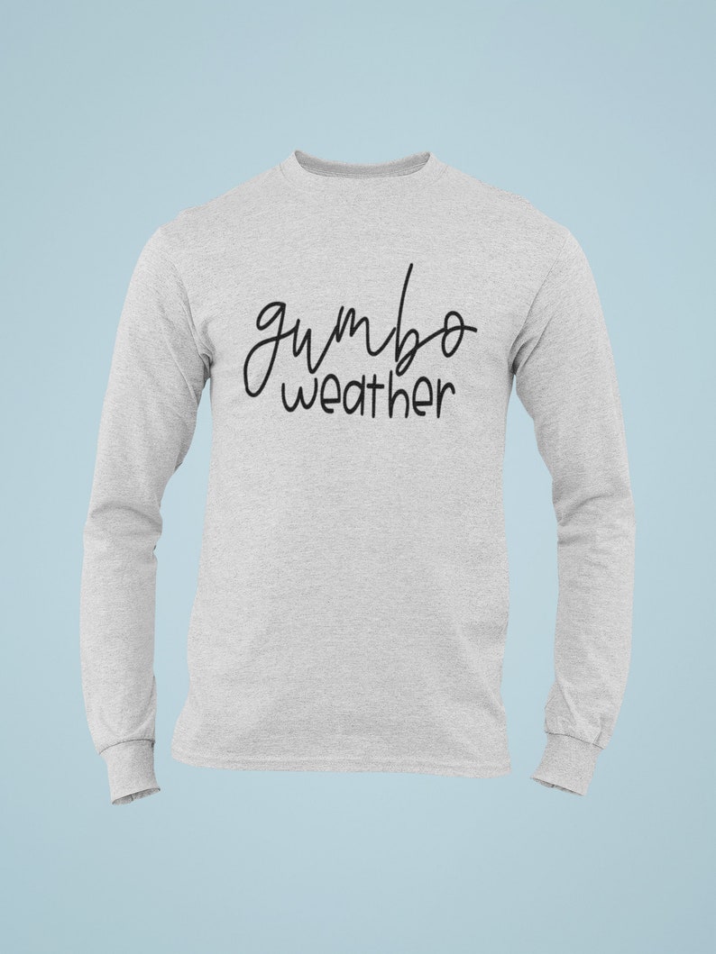 May include: A gray long-sleeve t-shirt with the text "gumbo weather" written in black cursive.