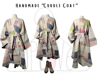 Handmade womens coat quilted fabric kimono duster. Matching belt. Retro biker girl patches. Reclaimed materials.  Big pockets. Unique. M - L