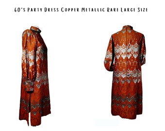 Rare plus size 60s party dress. Metallic copper and silver brocade. Bishop sleeves, Tunic with side slits, turtle neck collar, midi length.