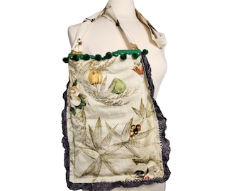Handmade messenger crossbody bag, long strap. green beige. Seeds, leaves, flowers. Reclaimed linen and vintage bobble trim. Inside pocket.