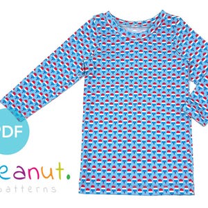 May include: A long-sleeved shirt with a repeating pattern of red, white, and blue popsicles on a light blue background. The shirt has a round neckline. The text "PDF" is in a blue circle, and the text "peanut. patterns" is in the lower left corner.