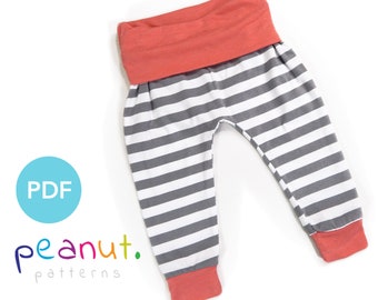 May include: A PDF pattern for making striped baby pants with a coral colored waistband and cuffs. The pattern is available from peanut. patterns.