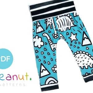May include: A pair of blue and white patterned leggings with a black waistband and black stripes. The leggings feature a dinosaur, mountain, and star design. The text "peanut. patterns" is visible in the lower left corner of the image.