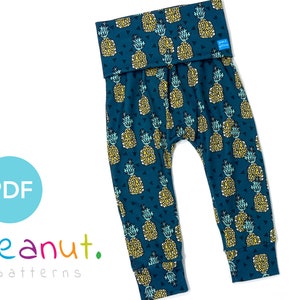 May include: Dark teal baby trousers featuring a repeating pattern of yellow pineapples and teal triangles. The trousers have a fold-over waistband and cuffs. The text "PDF" is in a light blue circle, and "peanut. patterns" is in a colourful font.