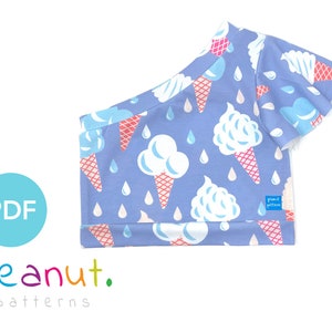 May include: A PDF sewing pattern for a blue one-shoulder top with a print of ice cream cones and raindrops. The pattern is from peanut. patterns.