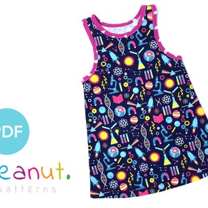 May include: A sleeveless dress with a navy blue background and a colorful print of science-themed icons, including rockets, atoms, microscopes, and test tubes. The dress has a pink trim around the neckline and armholes.