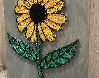 Enseigne ligaturée tournesol