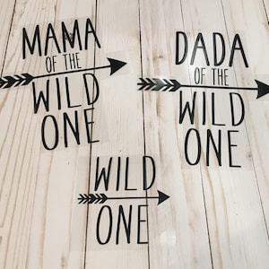 May include: Three black vinyl decals with an arrow and the text "Mama of the Wild One", "Dada of the Wild One", and "Wild One".