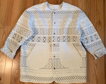 Upcycled quilt bubble-style jacket in gray and white geometric embroidery