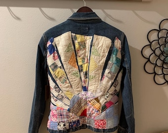 Upcycled denim jacket - the sunburst jacket featuring appliqué of colorful quilt scraps