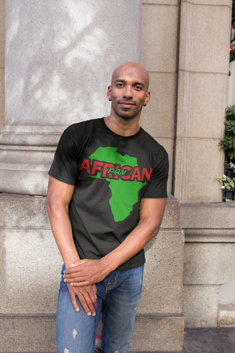 May include: A black t-shirt with a green outline of the continent of Africa and the text "Pan African" in red.