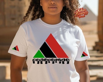 May include: White t-shirt with a Pan-African design. The shirt features a large red, black, and green triangle graphic on the front, with the word "PANAFRICAN" printed below. Small Pan-African flag triangles are on the sleeves.
