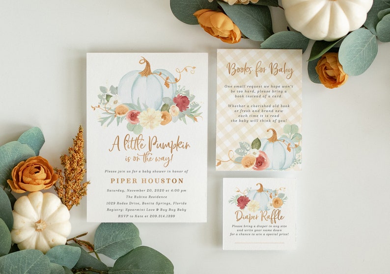 May include: A baby shower invitation with a watercolor illustration of a pumpkin and flowers. The invitation reads "A little Pumpkin is on the way!" and includes the name Piper Houston, the date and time of the shower, and the address. There are also two smaller cards, one for a book request and one for a diaper raffle.