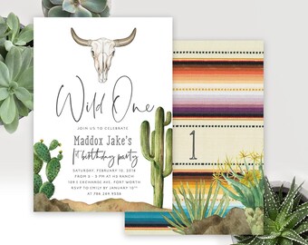 May include: A rectangular invitation card featuring a bull skull, a saguaro cactus, and a prickly pear cactus with the text Wild One Maddox Jake's 1st birthday party, alongside a matching card with a striped pattern and the number 1.